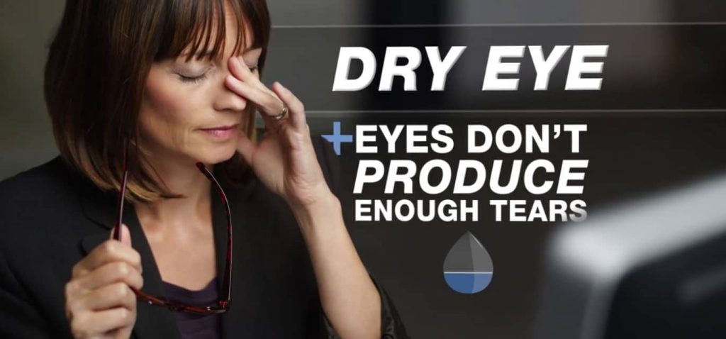 Woman rubbing her irritated eyes